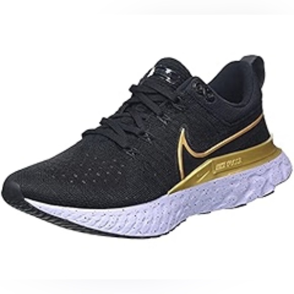 womens nike black with gold swoosh